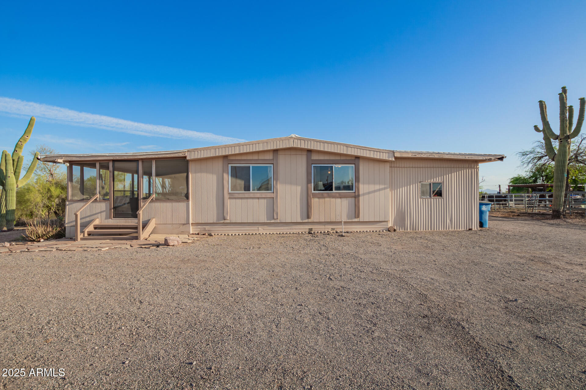 1888 South Goldfield Road Apache Junction, AZ 85119 - Photo 3 of 27 a view of a house with backyard and parking