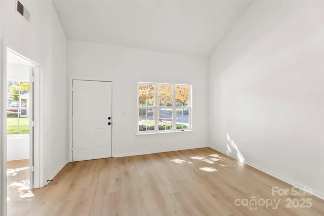 an empty room with windows