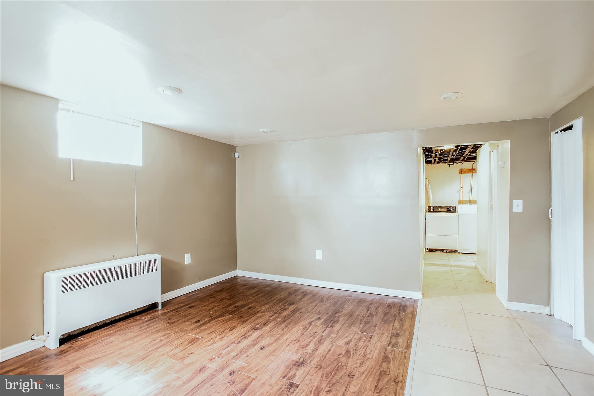 1708 Pin Oak Road Baltimore, MD 21234 - Photo 25 of 30 Family room downstairs looking toward laundry area