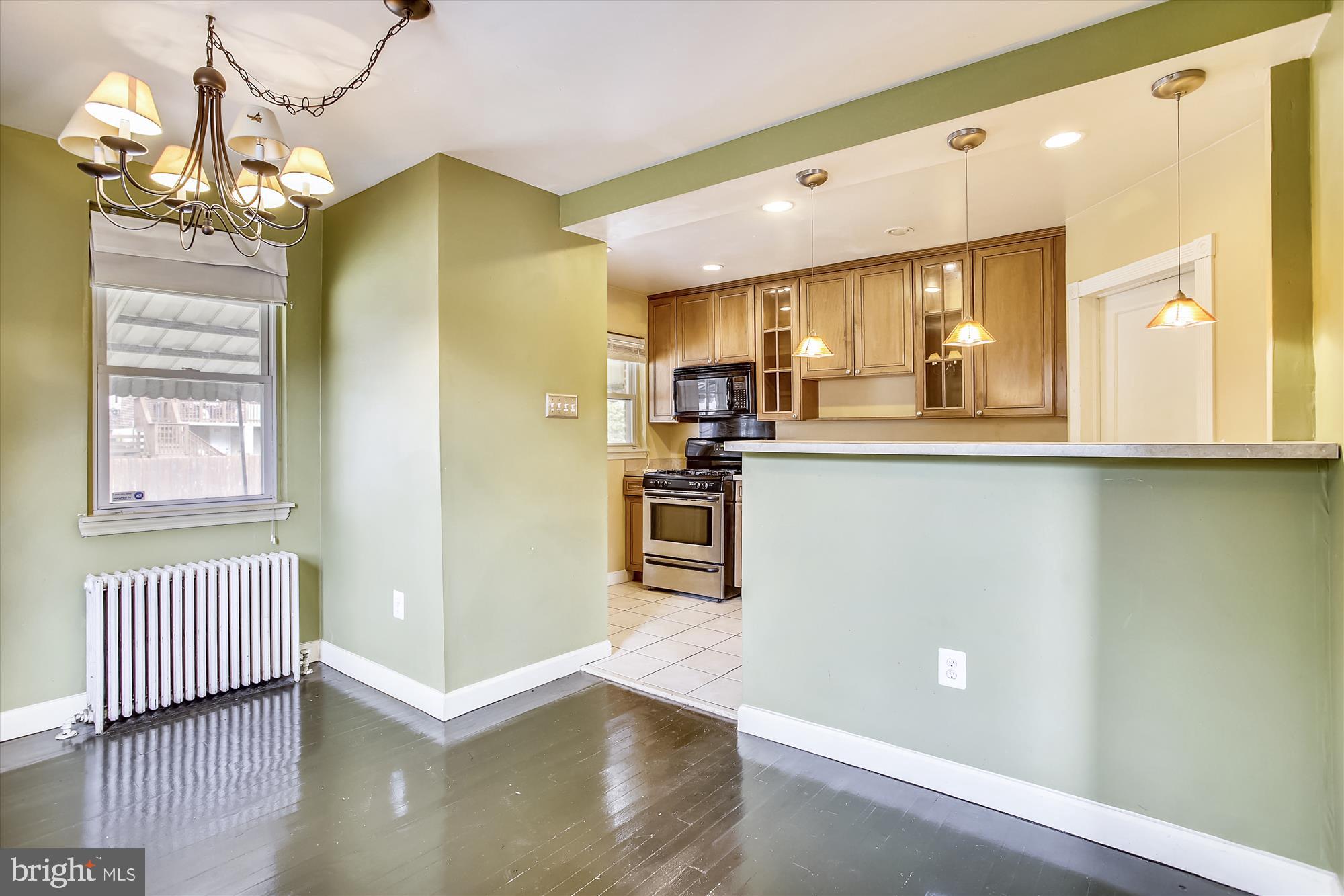 1708 Pin Oak Road Baltimore, MD 21234 - Photo 7 of 30 Nice dining room, with kitchen bar