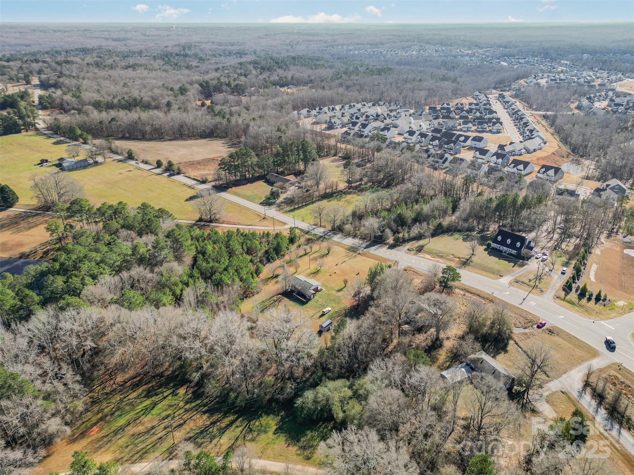 1950 Holbrook Road Fort Mill, SC 29715 - Photo 14 of 16 an aerial view of residential houses with outdoor space