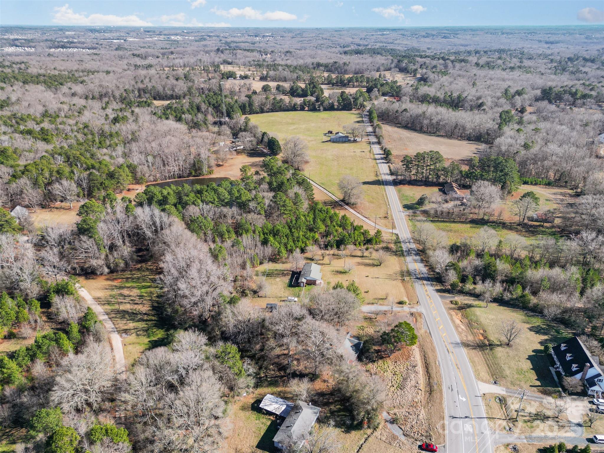 1950 Holbrook Road Fort Mill, SC 29715 - Photo 16 of 16 an aerial view of residential houses with outdoor space