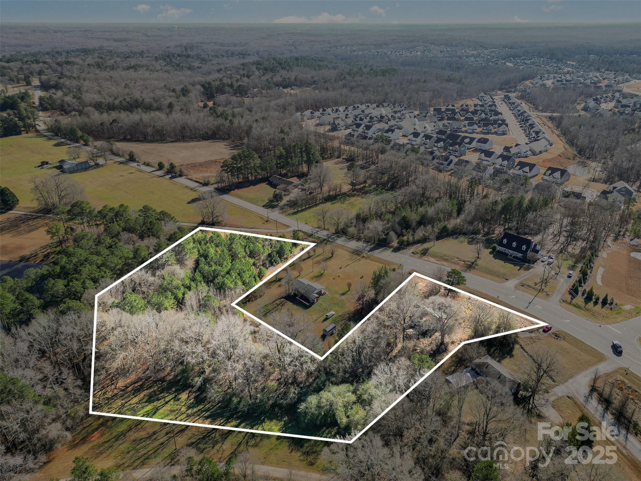 1950 Holbrook Road Fort Mill, SC 29715 - Photo 2 of 16 an aerial view of house with yard