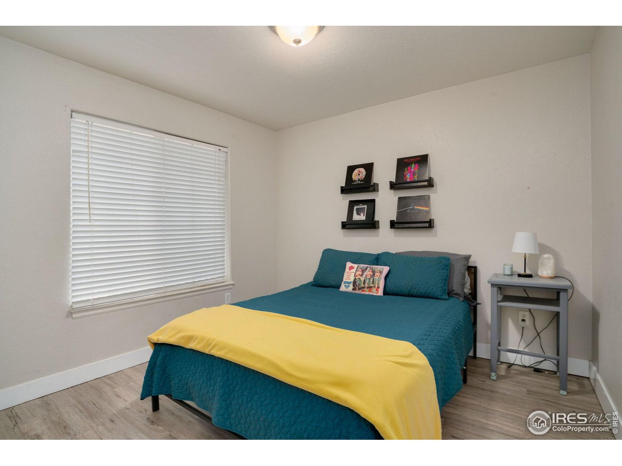 93 Summit View Road Severance, CO 80550 - Photo 11 of 27 a bedroom with a bed and a desk