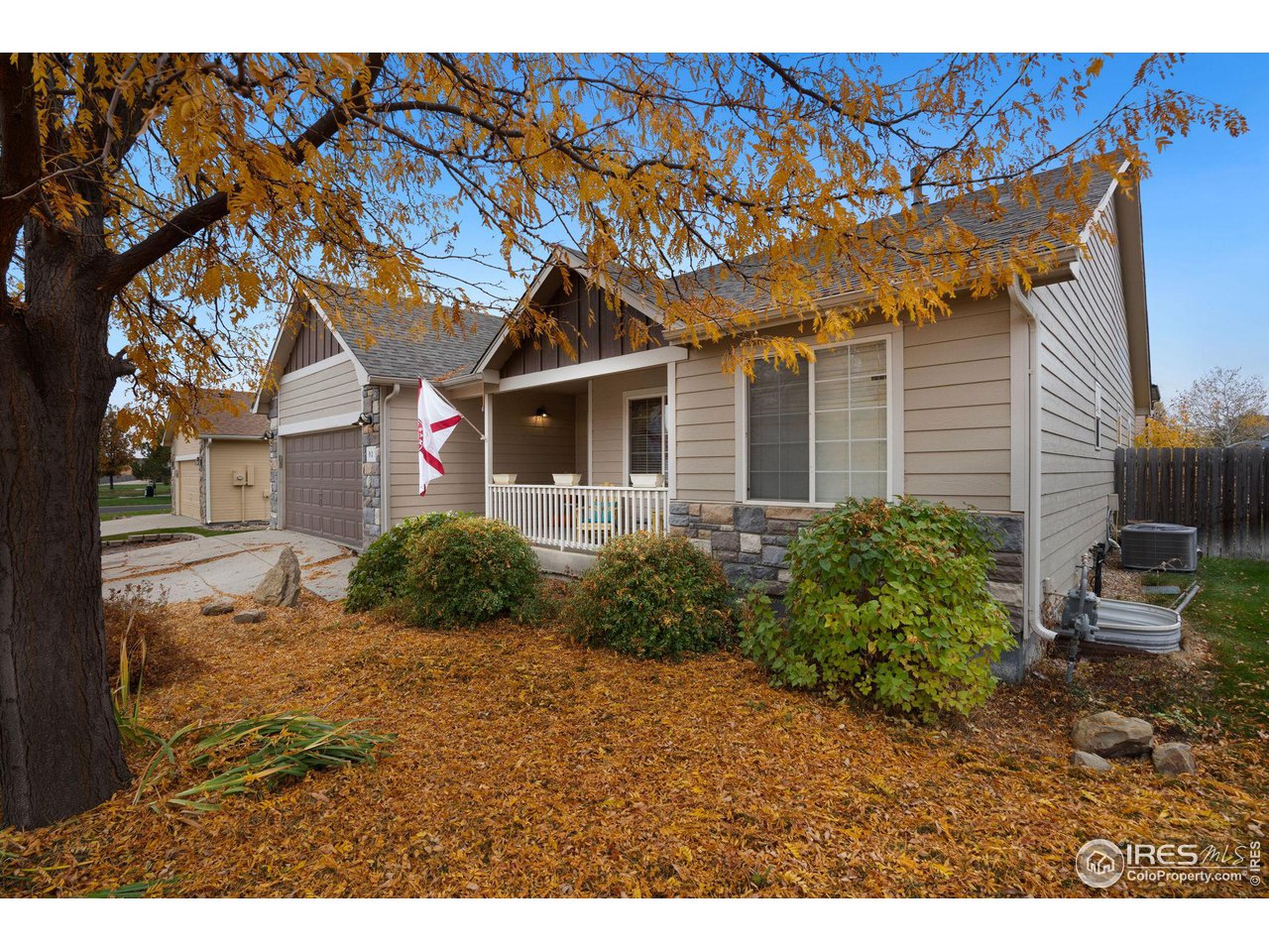 93 Summit View Road Severance, CO 80550 - Photo 2 of 27 a front view of a house with garden