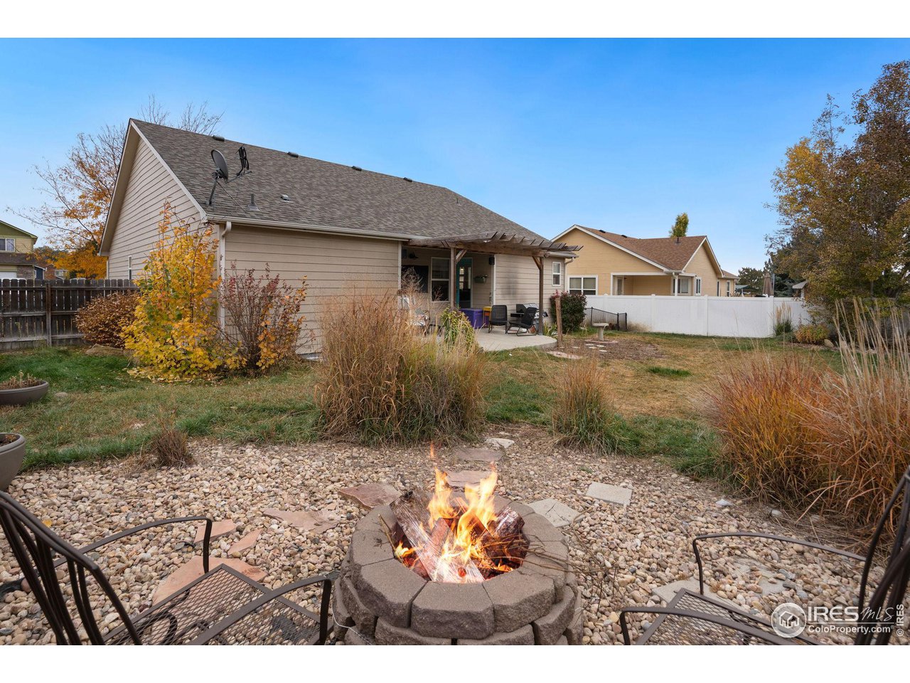 93 Summit View Road Severance, CO 80550 - Photo 21 of 27 a view of a house with a yard