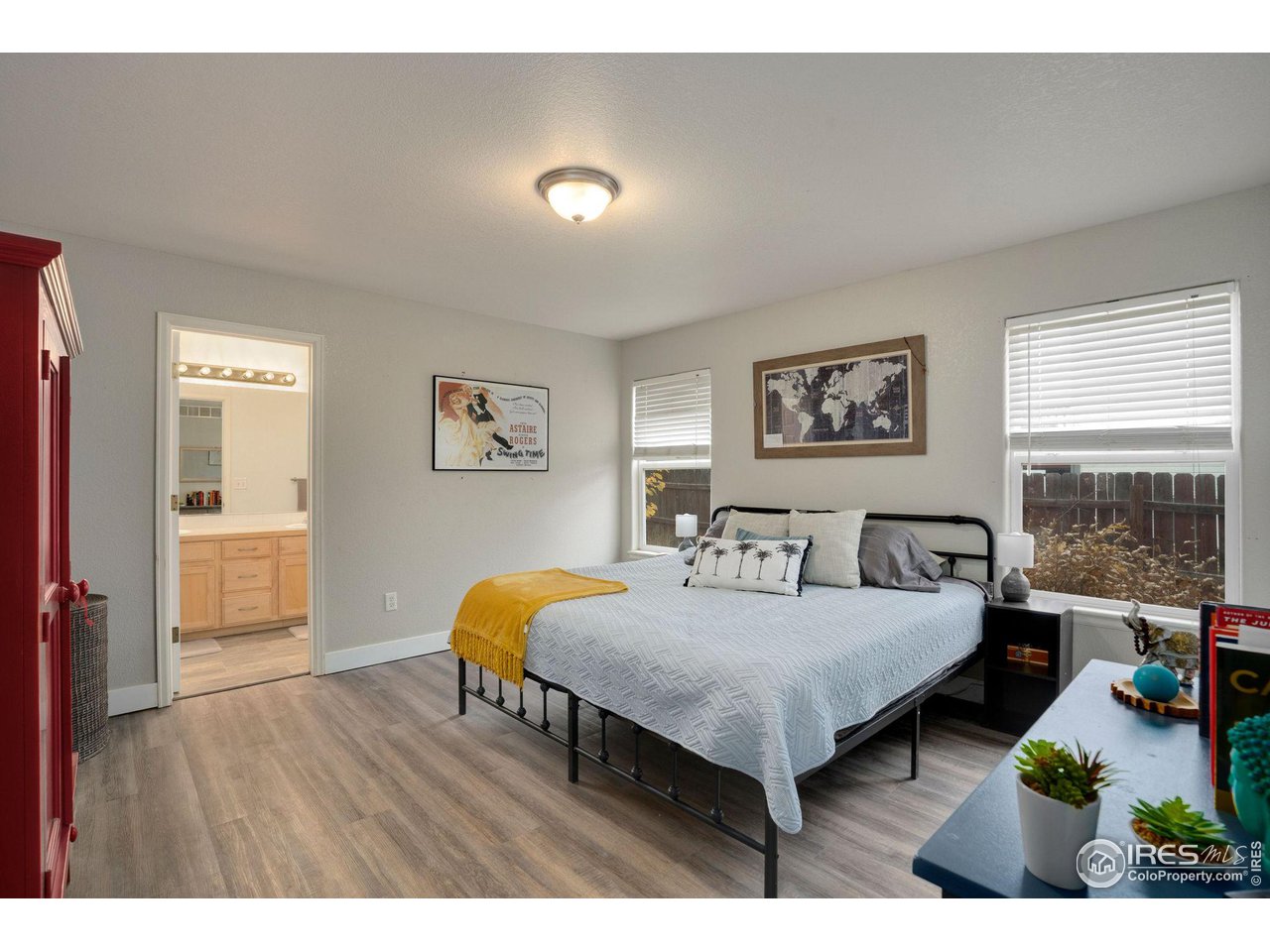 93 Summit View Road Severance, CO 80550 - Photo 9 of 27 a bedroom with a bed and a table