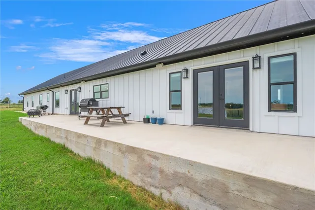 a house view with a garden space