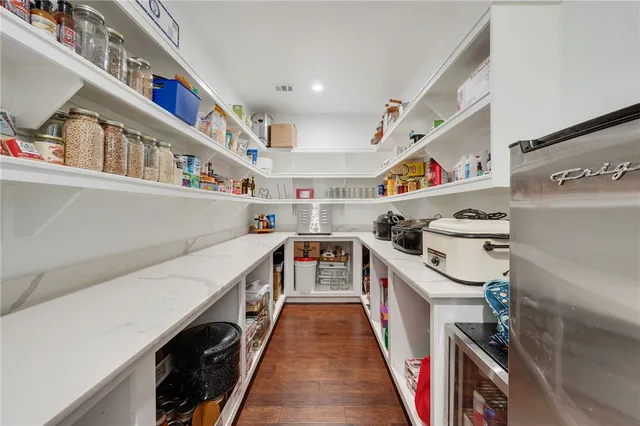 a storage room with washer and dryer
