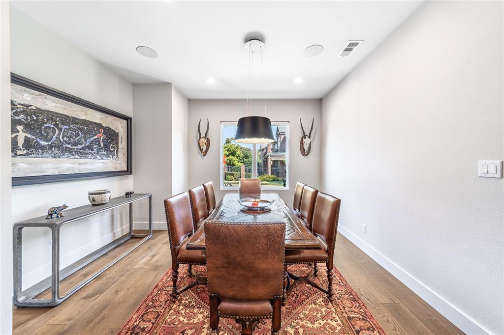 4144 Entrada Way Dallas, TX 75219 - Photo 12 of 34 a dining room with furniture and window