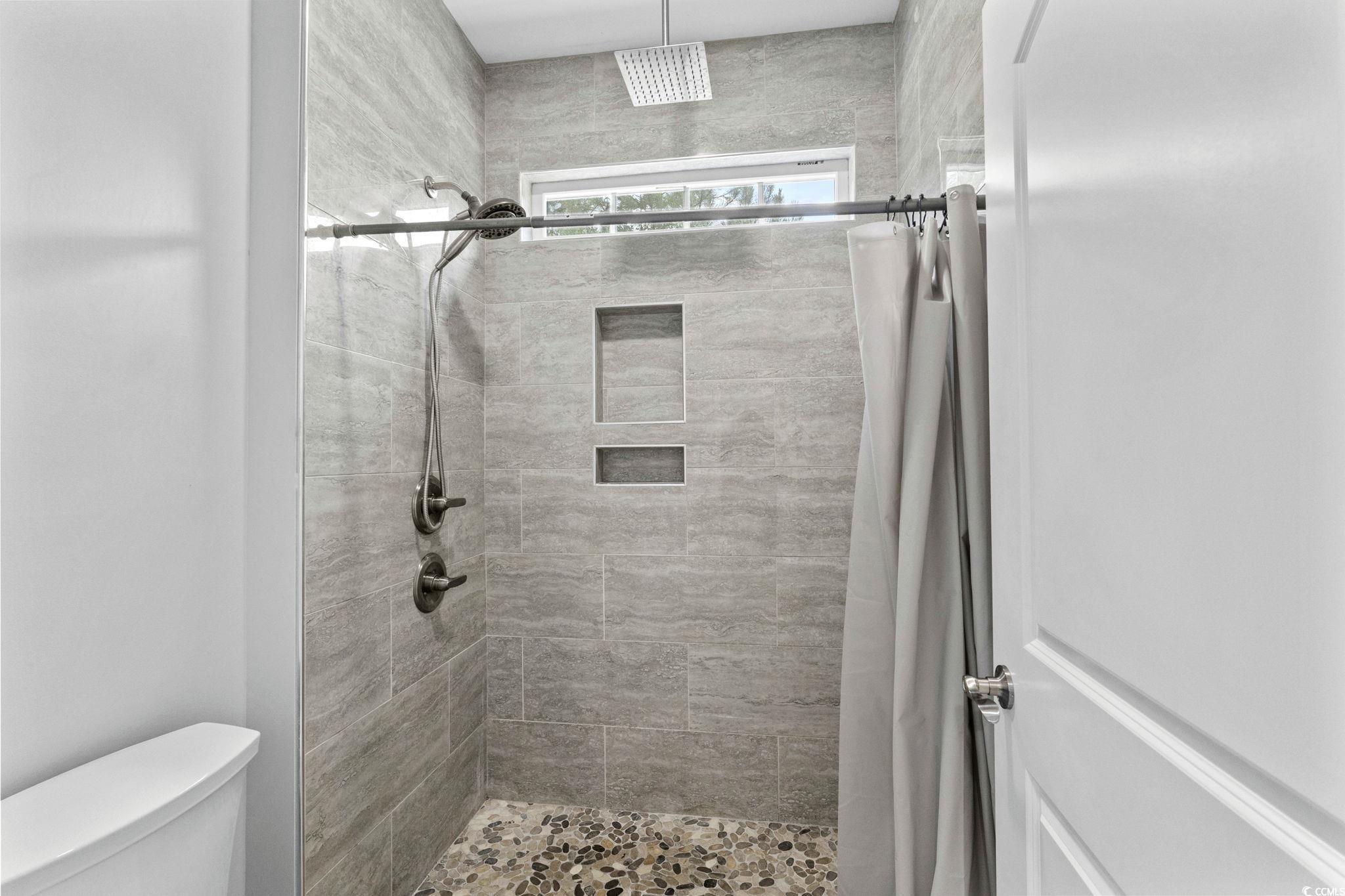 2133 Carries Lane Road Longs, SC 29568 - Photo 30 of 40 Bathroom featuring tiled shower