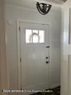 a bathroom with a sink and a window