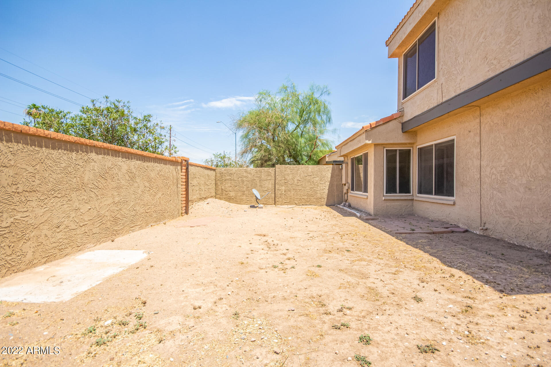 2415 West Greenway Road, Unit 3 Phoenix, AZ 85023 - Photo 24 of 36 a house view with a backyard