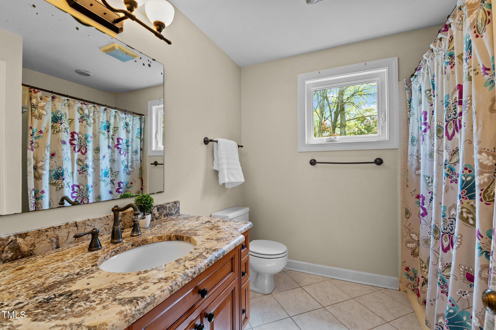 7317 Mill Ridge Road Raleigh, NC 27613 - Photo 22 of 30 Upstairs Bathroom