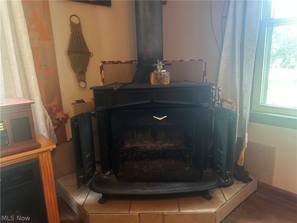 5742 Grove Road Clinton, OH 44216 - Photo 4 of 37 Woodburning Stove