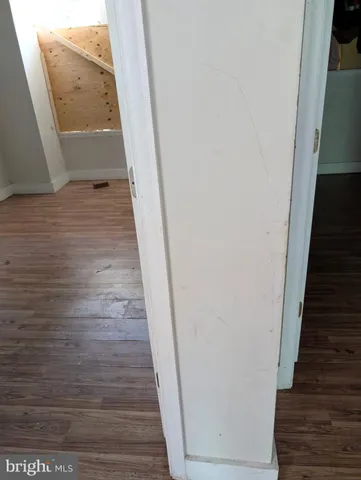 a view of a livingroom with wooden floor