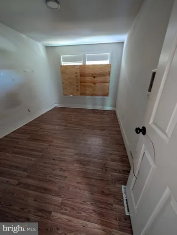 a view of living room with furniture and flat screen tv