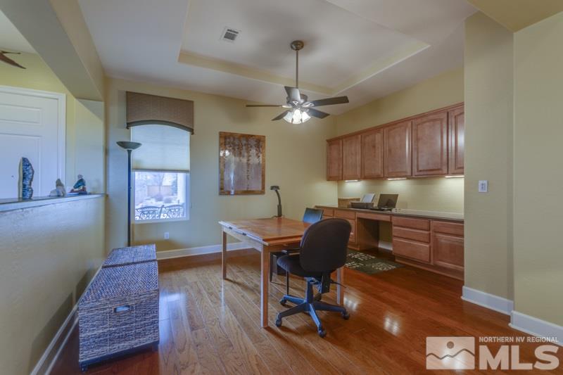 1065 Meridian Ranch Drive Reno, NV 89523 - Photo 12 of 25 a workspace with wooden floor