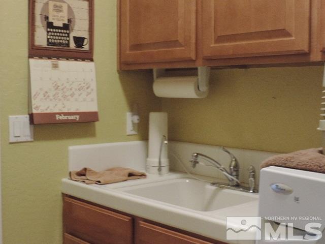 1065 Meridian Ranch Drive Reno, NV 89523 - Photo 17 of 25 a bathroom with a sink and a toilet