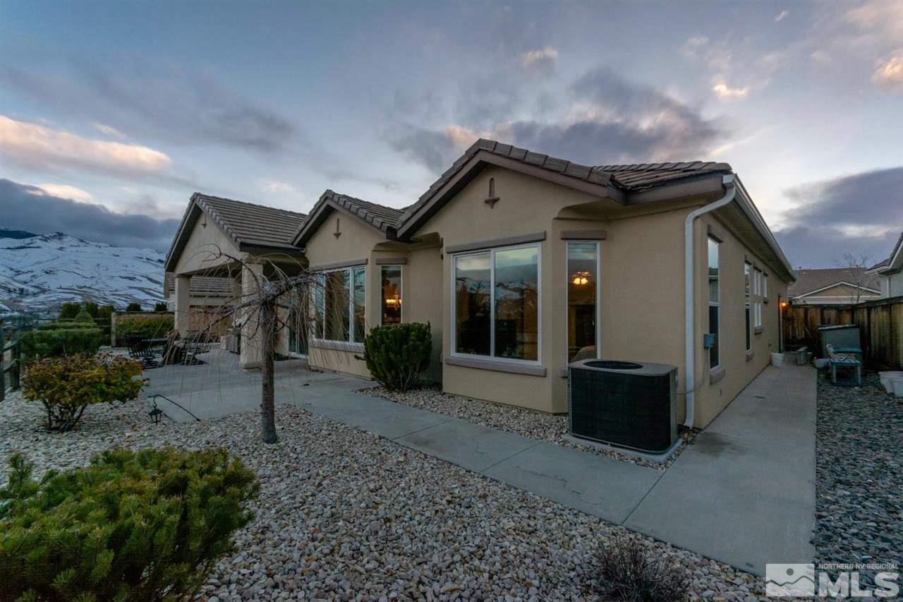 1065 Meridian Ranch Drive Reno, NV 89523 - Photo 21 of 25 a front view of a house with garden