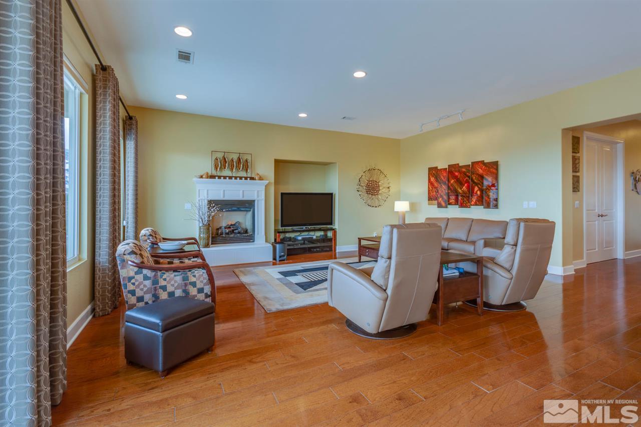 1065 Meridian Ranch Drive Reno, NV 89523 - Photo 6 of 25 a living room with furniture and a flat screen tv