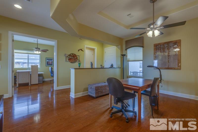 1065 Meridian Ranch Drive Reno, NV 89523 - Photo 8 of 25 a workspace with furniture and wooden floor