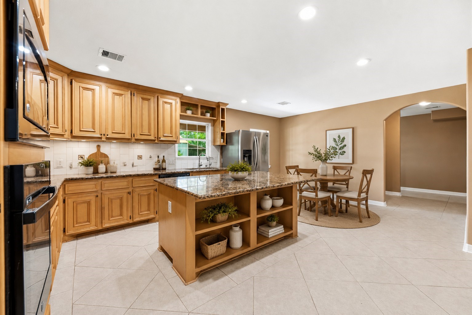 523 Moore Bar Road Rosenberg, TX 77471 - Photo 33 of 50 Kitchen and breakfast area, virtually staged.