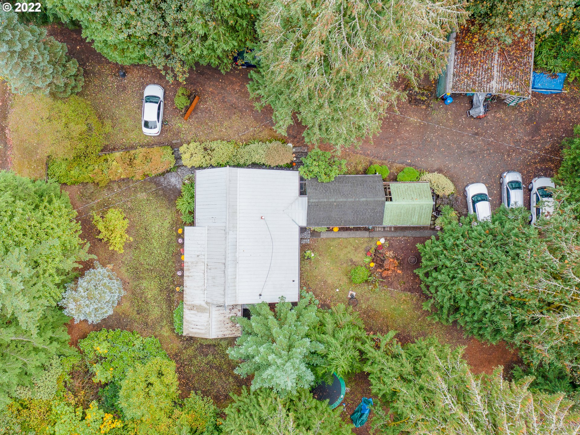 15910 Southeast Ten Eyck Road Sandy, OR 97055 - Photo 15 of 32 an aerial view of a house with a yard and garden
