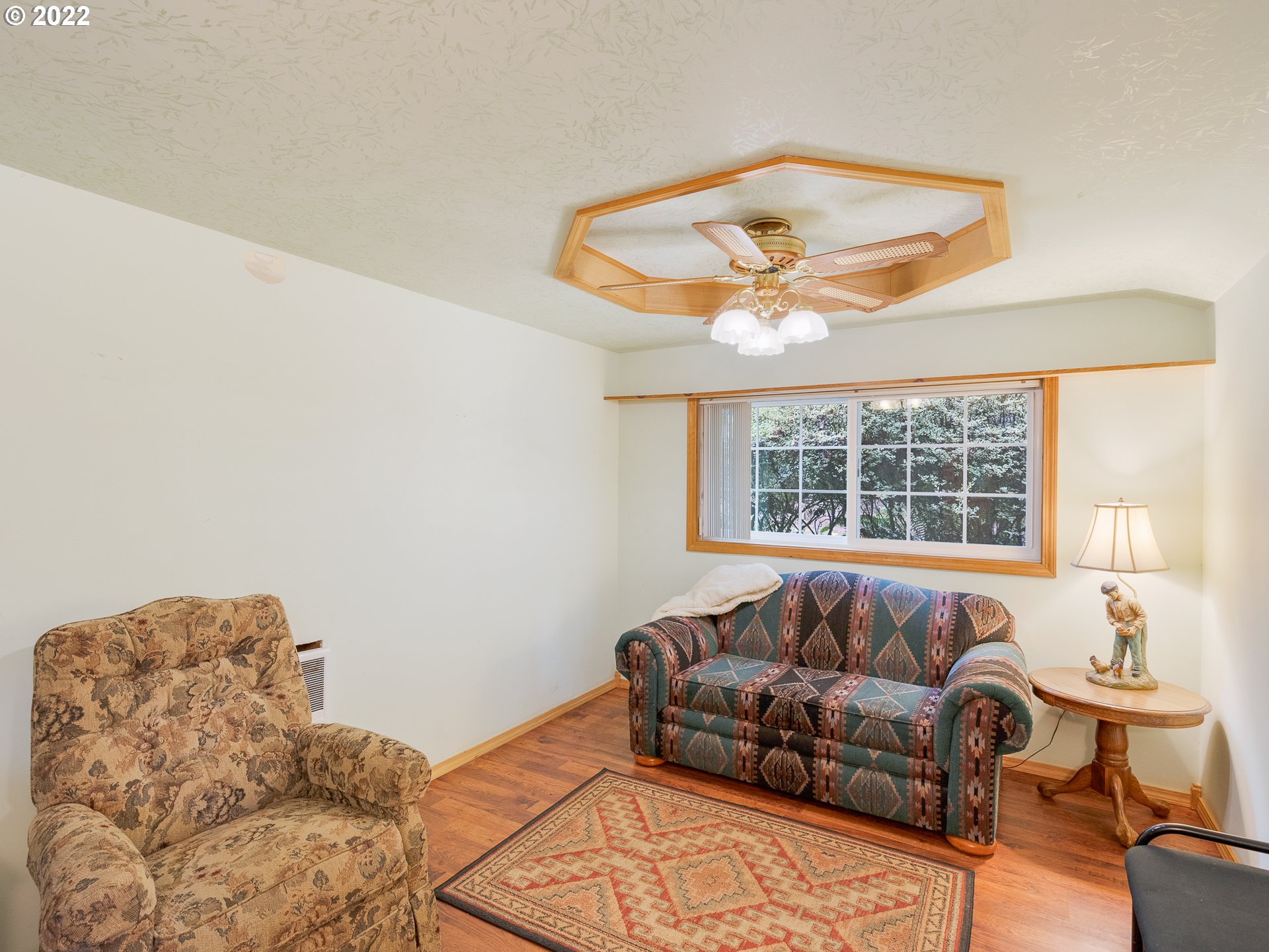 15910 Southeast Ten Eyck Road Sandy, OR 97055 - Photo 30 of 32 a living room with furniture and a large window