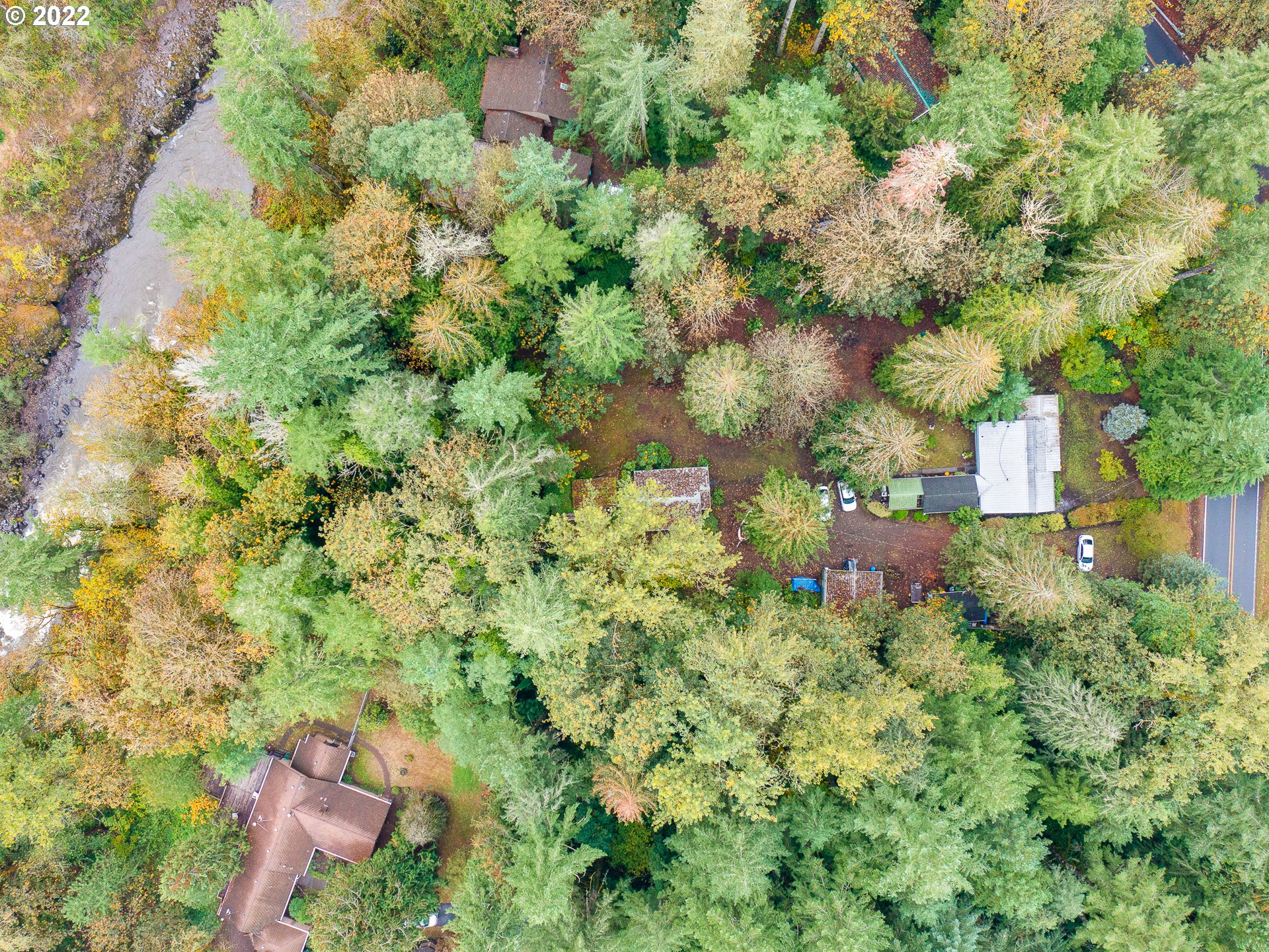 15910 Southeast Ten Eyck Road Sandy, OR 97055 - Photo 3 of 32 an aerial view of residential house with outdoor space and trees all around