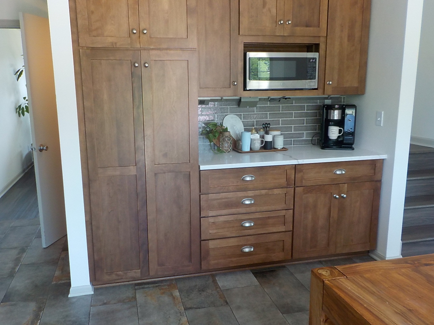 4412 Ridgeview Lane Byron, IL 61010 - Photo 11 of 35 a room with cabinets and flat screen tv