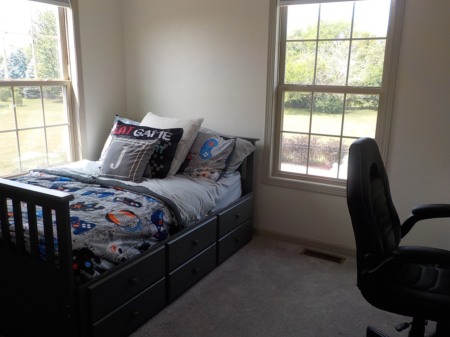 4412 Ridgeview Lane Byron, IL 61010 - Photo 17 of 35 a bedroom with a bed and a window