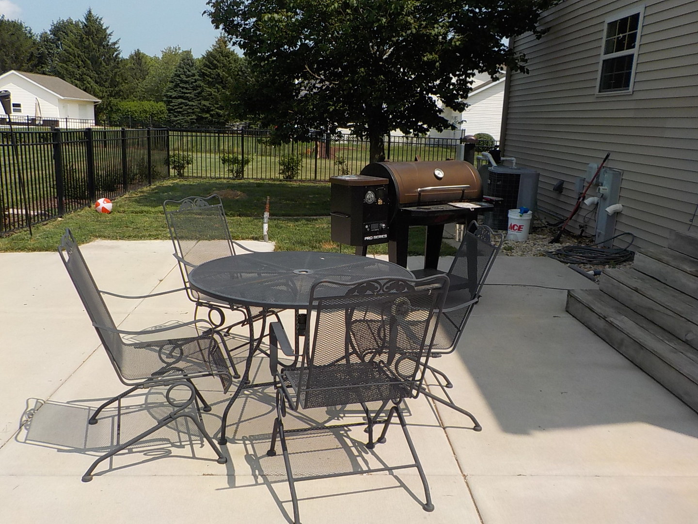 4412 Ridgeview Lane Byron, IL 61010 - Photo 6 of 35 a view of a backyard with sitting area and furniture