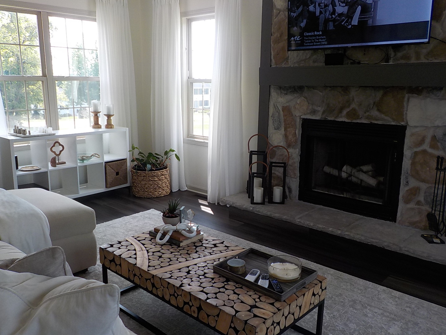 4412 Ridgeview Lane Byron, IL 61010 - Photo 7 of 35 a living room with furniture and a fireplace