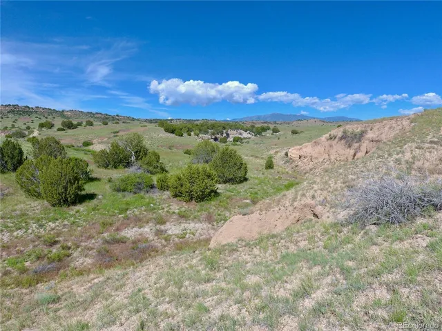a view of a lake with mountains in the background