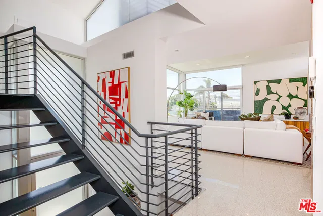 a view of a workspace with furniture