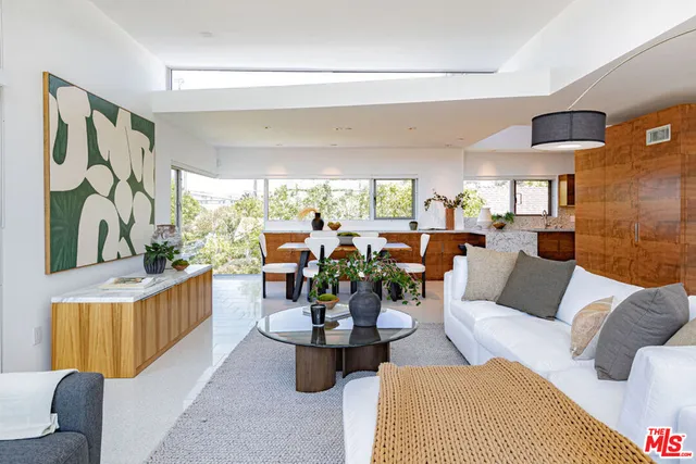 a view of staircase with a rug