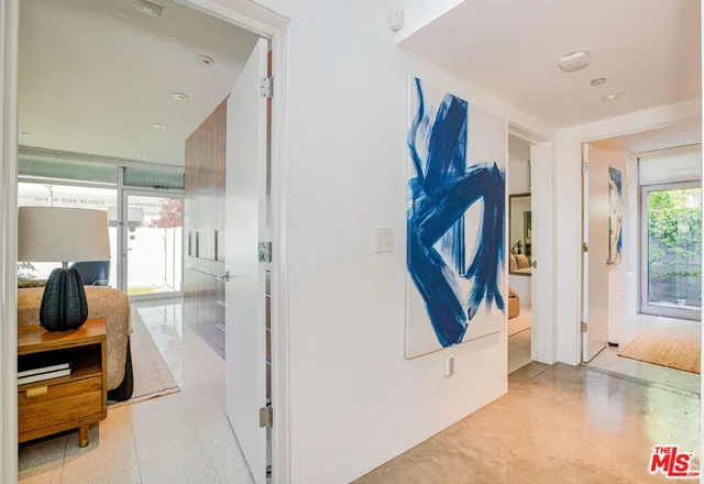 a bathroom with a potted plant