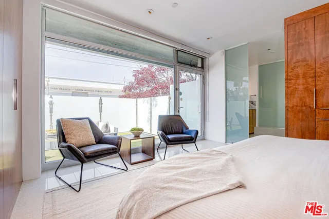 a bath room with a toilet and a tub