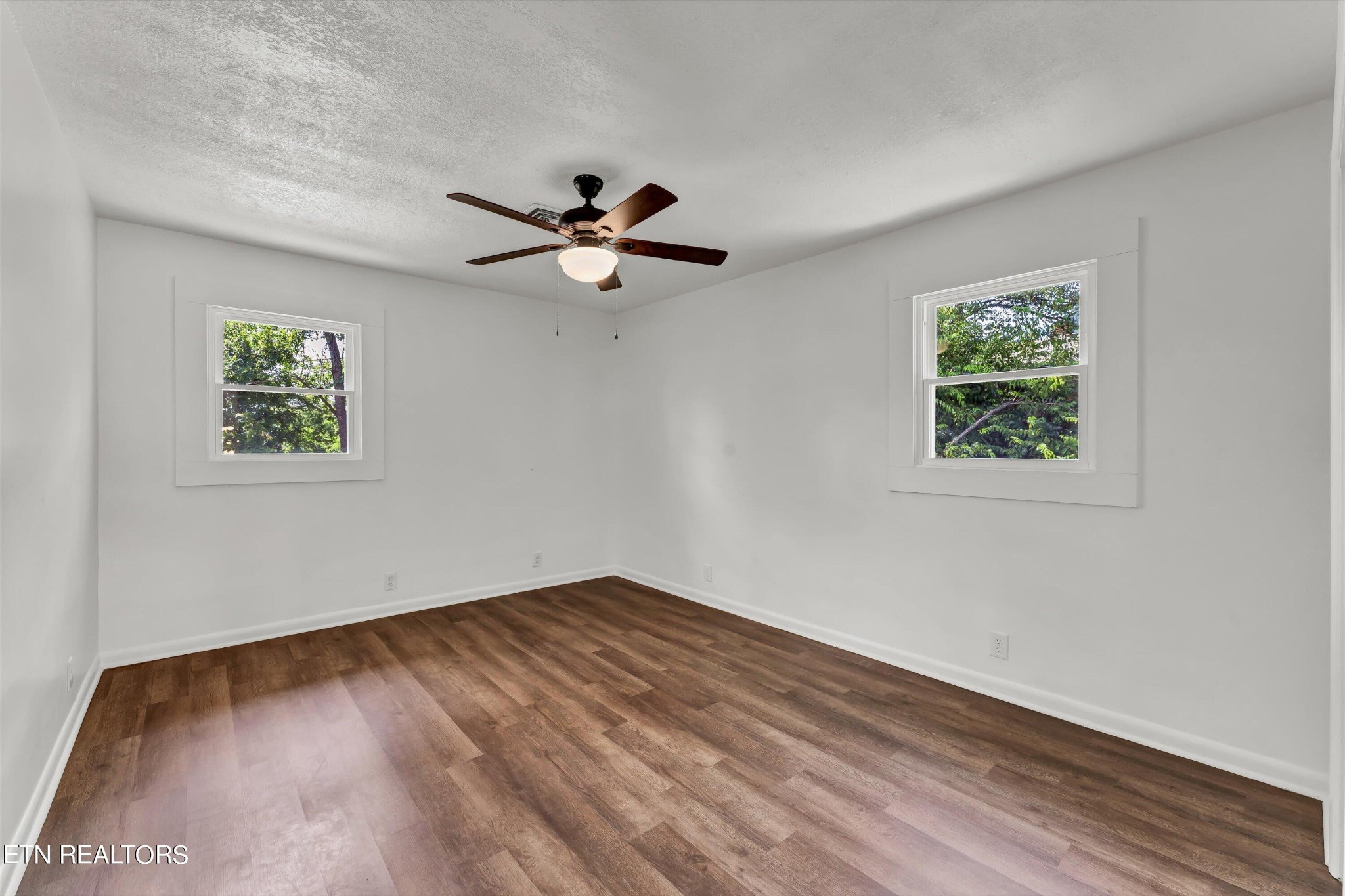 133 Londonderry Road Knoxville, TN 37923 - Photo 20 of 35 a view of empty room with wooden floor