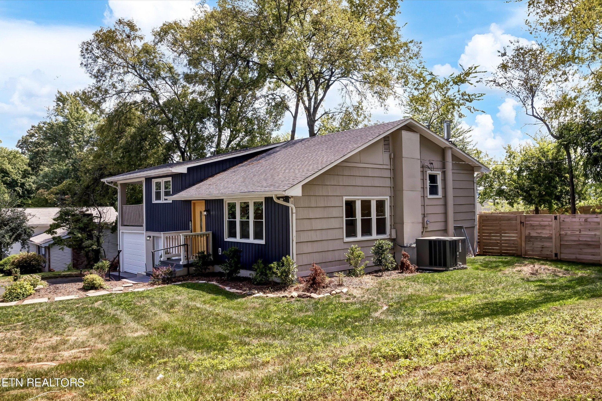 133 Londonderry Road Knoxville, TN 37923 - Photo 2 of 35 a view of a house with a yard and potted plants