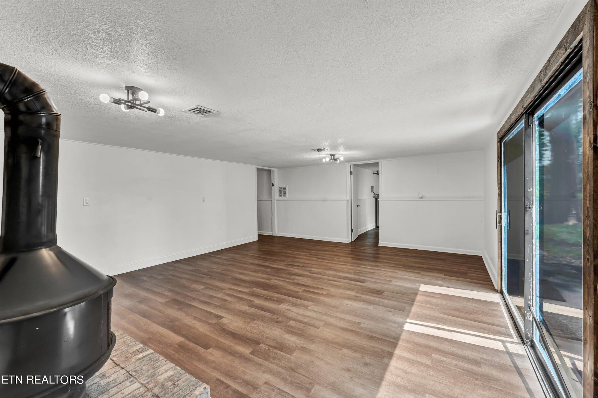 133 Londonderry Road Knoxville, TN 37923 - Photo 22 of 35 a view of an empty room and a gallery