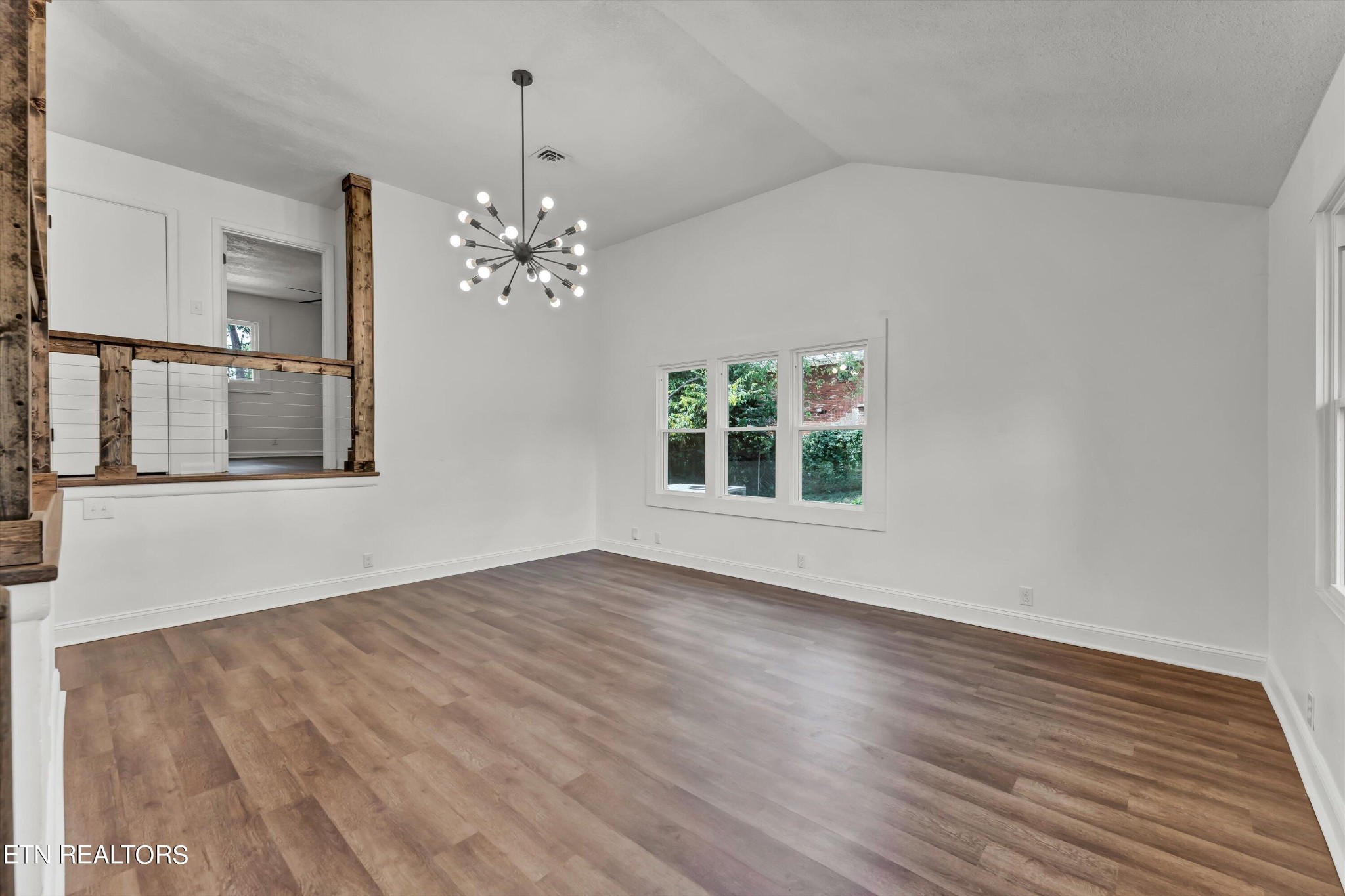 133 Londonderry Road Knoxville, TN 37923 - Photo 4 of 35 a view of an empty room with window