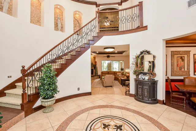 a view of a entryway door of the house and entryway