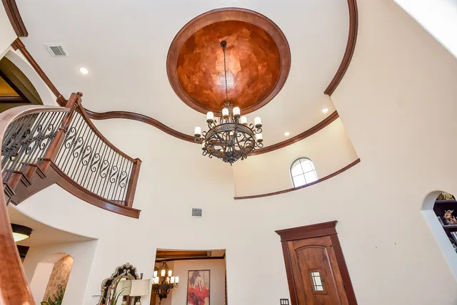 a vase with flowers sitting on a table