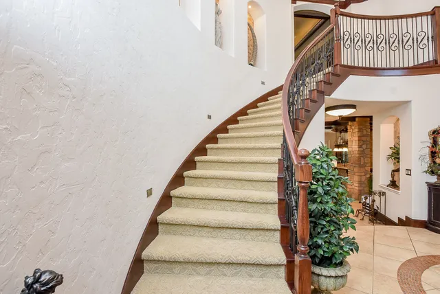 a view of entryway with flower pots