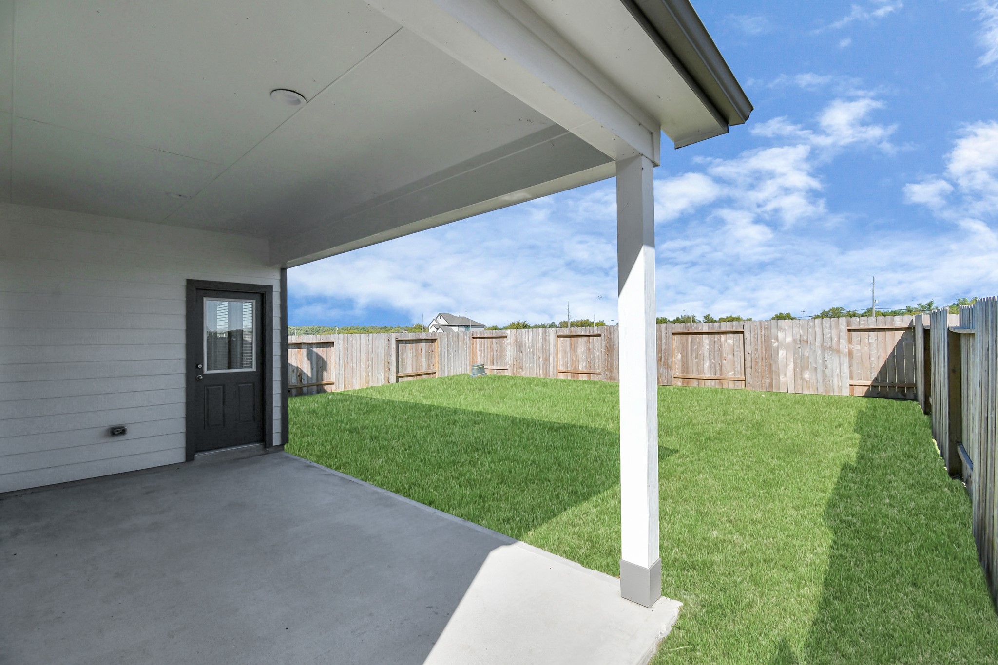 14823 Surfbird Lane Houston, TX 77049 - Photo 38 of 45 Experience outdoor living at its finest on this expansive covered patio, thoughtfully designed for BBQs and delightful outdoor dining.