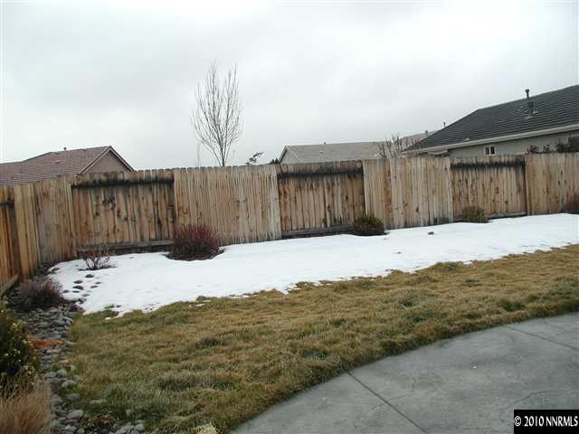 9565 Navigator Drive Reno, NV 89521 - Photo 8 of 9 a view of a backyard of the house