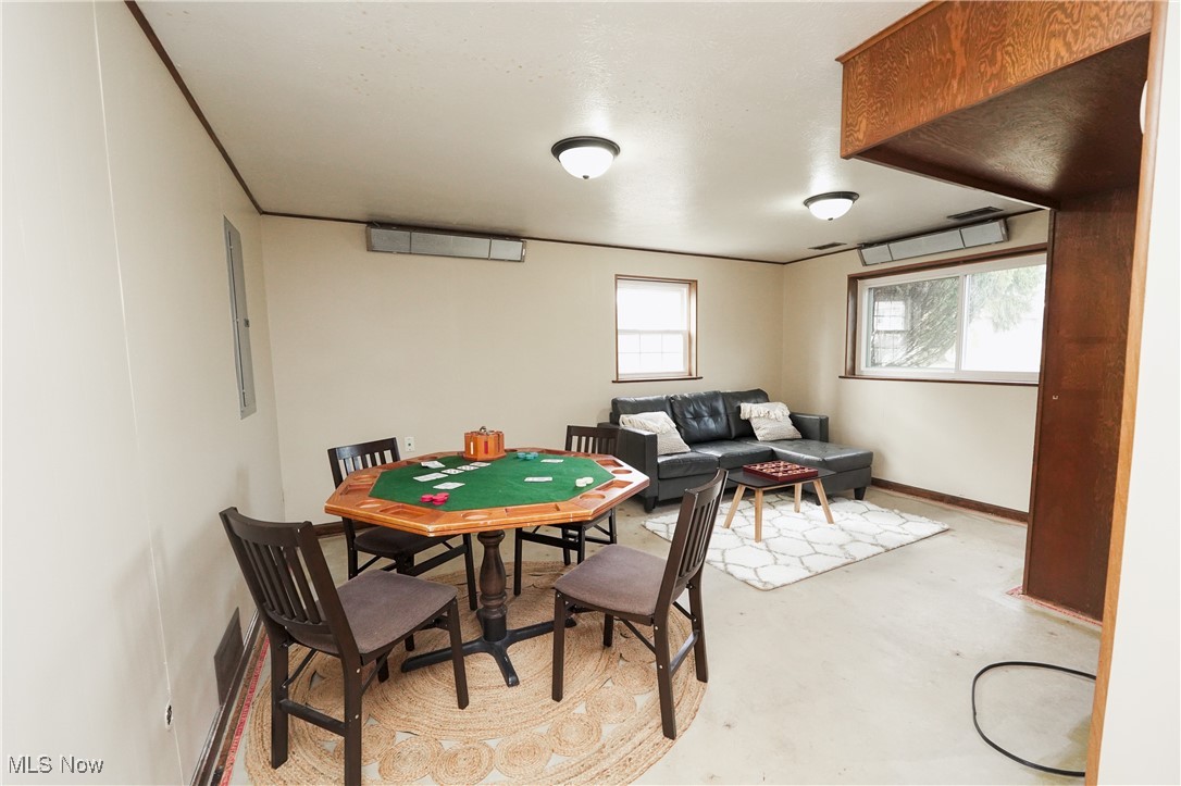 2674 Smith Road Fairlawn, OH 44333 - Photo 25 of 31 Game room featuring concrete floors and baseboards
