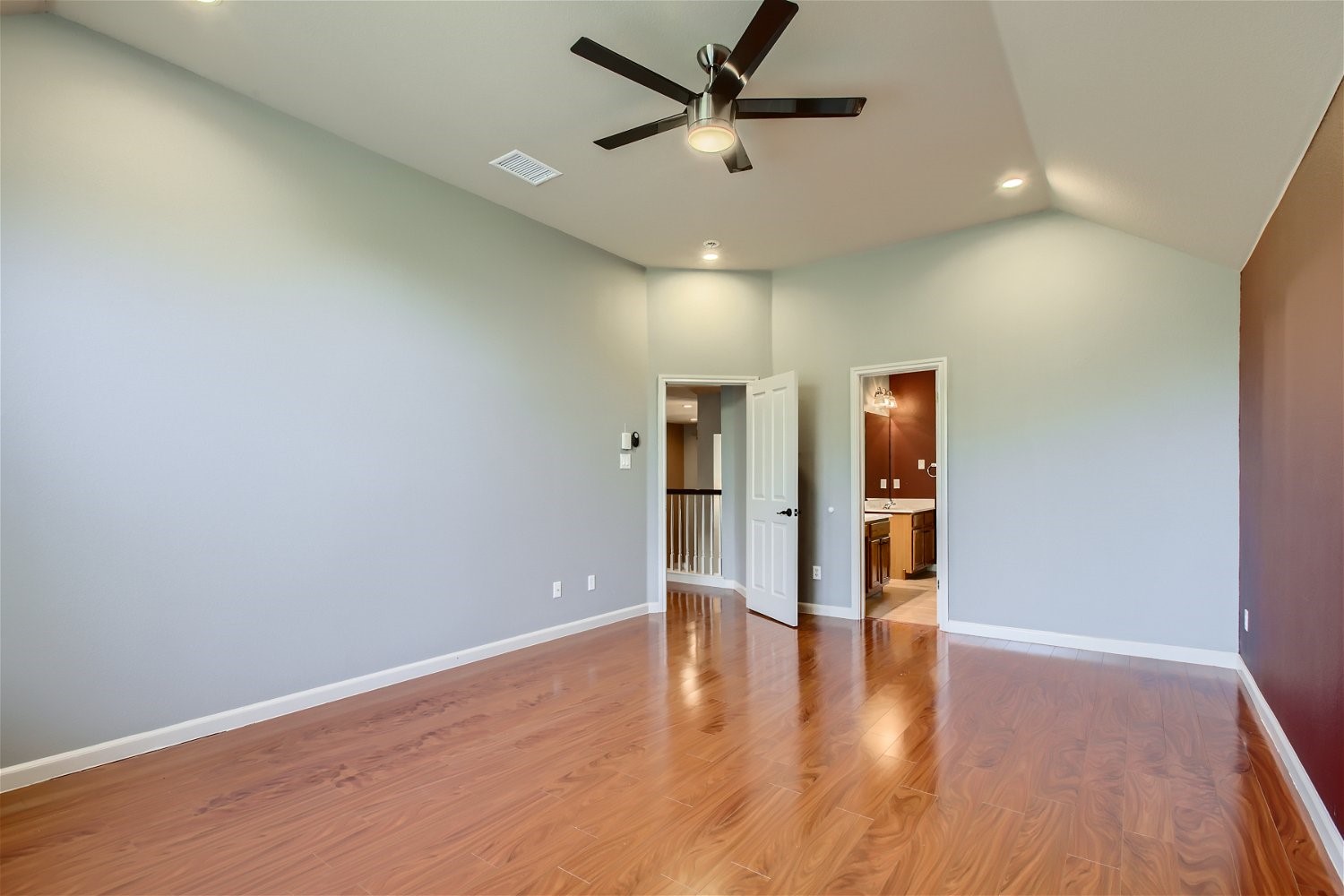 5320 Spirea Cove Austin, TX 78749 - Photo 14 of 28 a view of an empty room with wooden floor